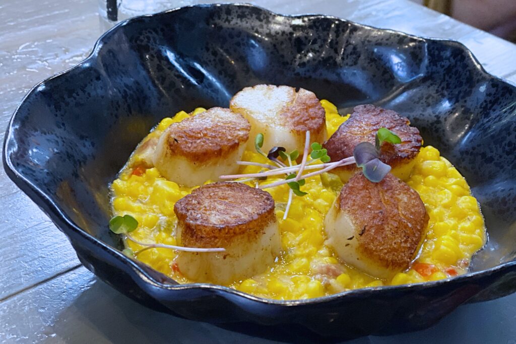 Scallops over roasted corn and corn and basil puree